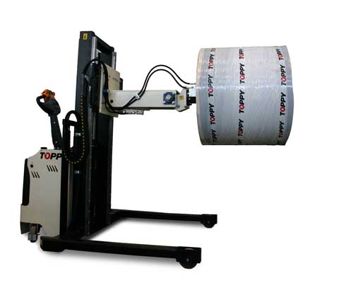 A roll turner machine turning a large industrial roll