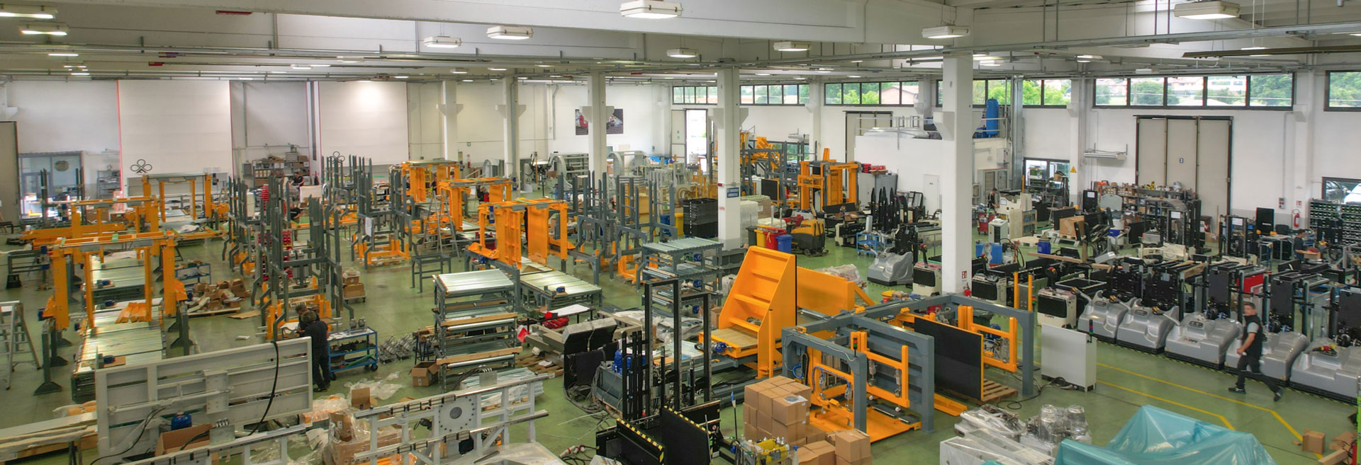 An image depicting a state-of-the-art pallet changer factory in operation